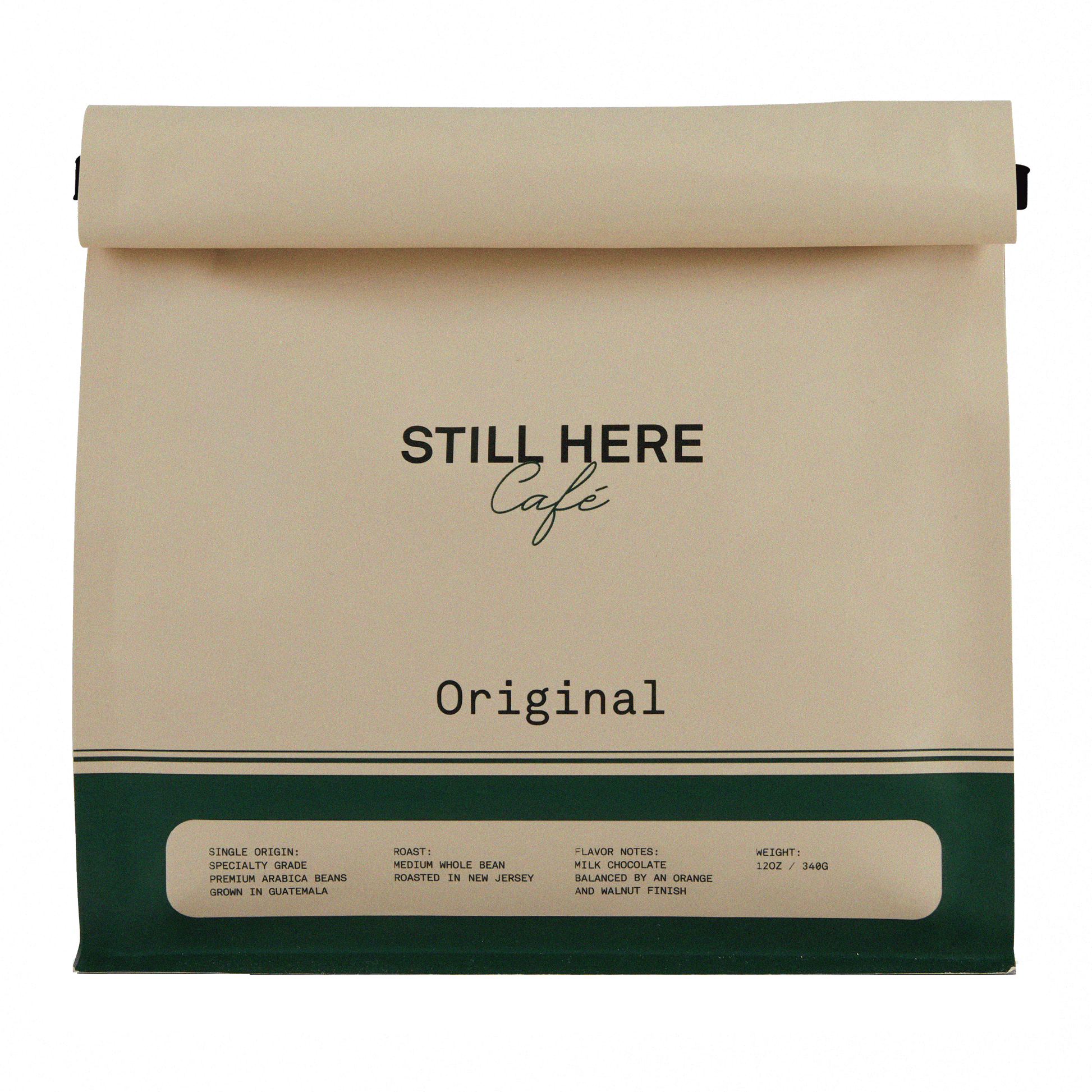 Packaging for Still Here Cafe Original coffee with branding and information on the front.
